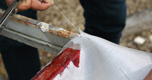 Tirage d'une fibre pour obtenir le trait de coupe